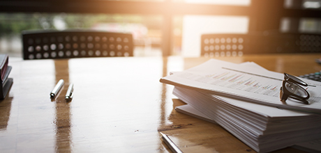 Papers on conference table