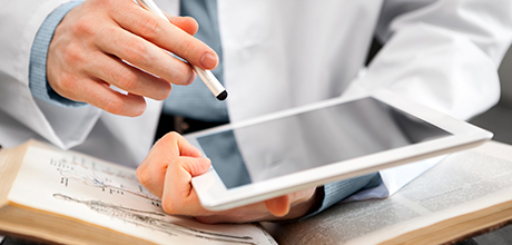 Doctor using tablet