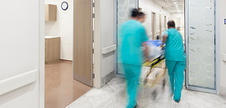 Doctors pushing guerney