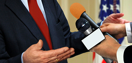 Speaking into microphone