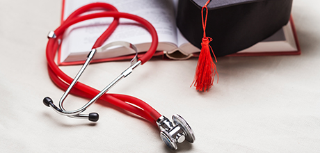 grad cap and stethoscope