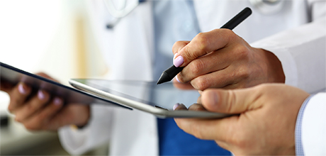 doctor on tablet