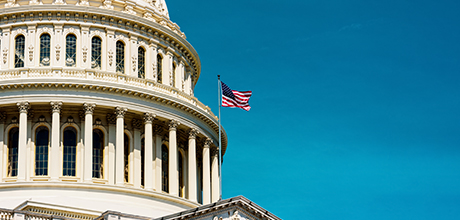 american flag on capitol