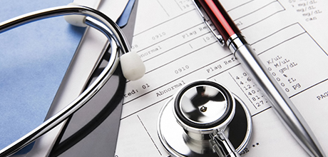 stethoscope, pen, billing papers