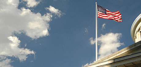 ohio statehouse and american flag
