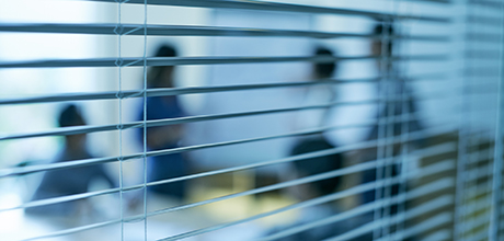 Meeting behind blinds