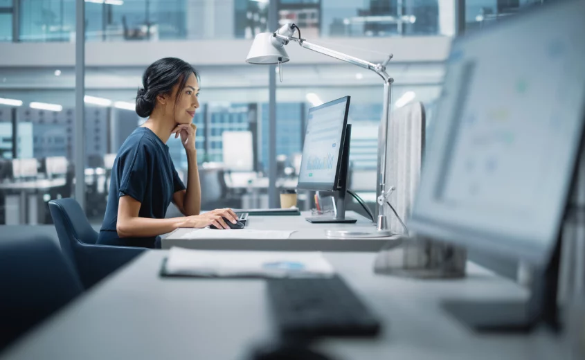 Person focused and working on computer