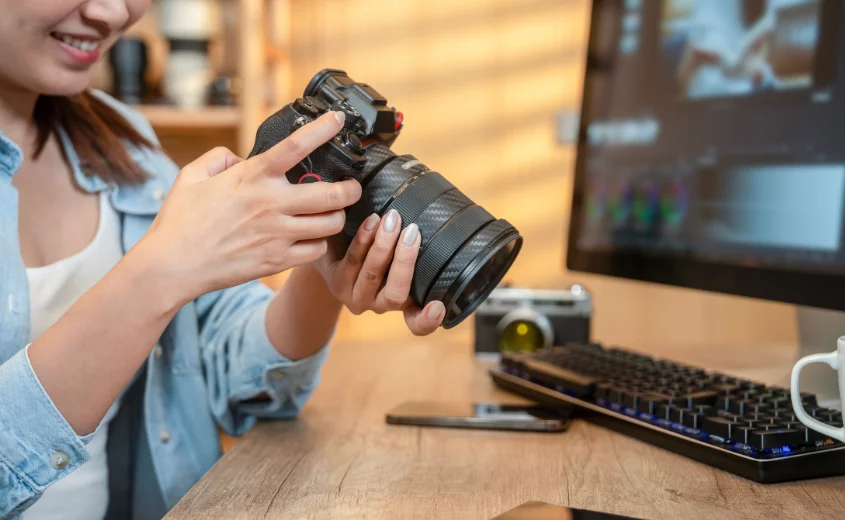 Person looking at camera on a desk