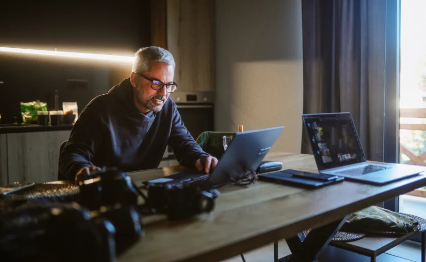 Person editing images on a computer