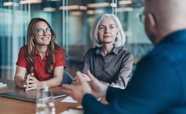 People discussing benefit plans