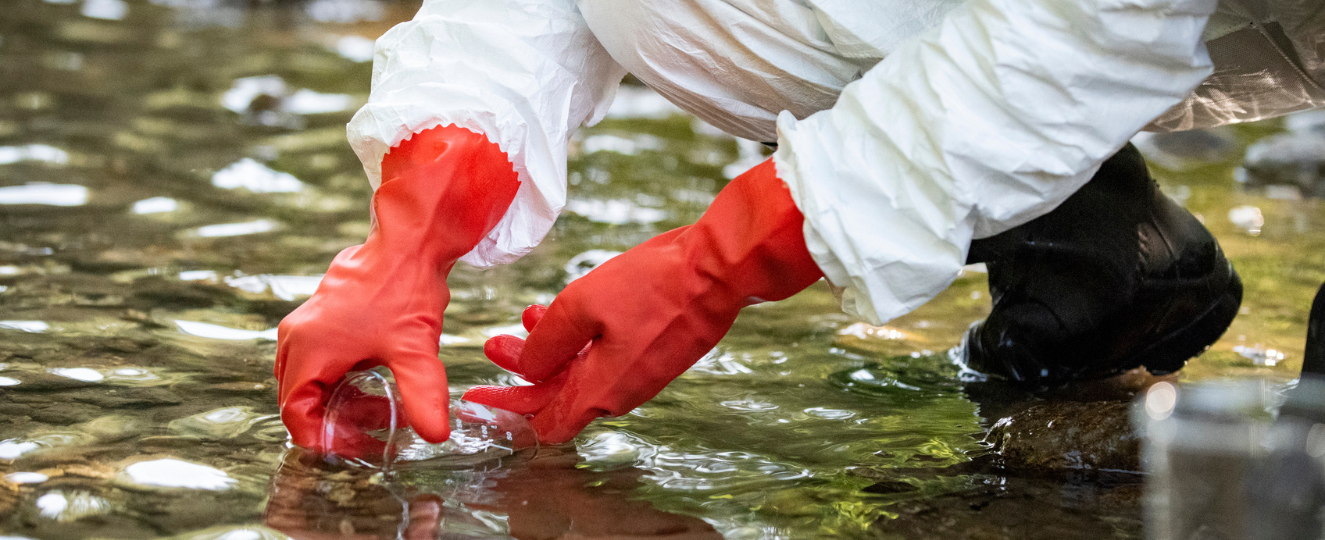Person testing water