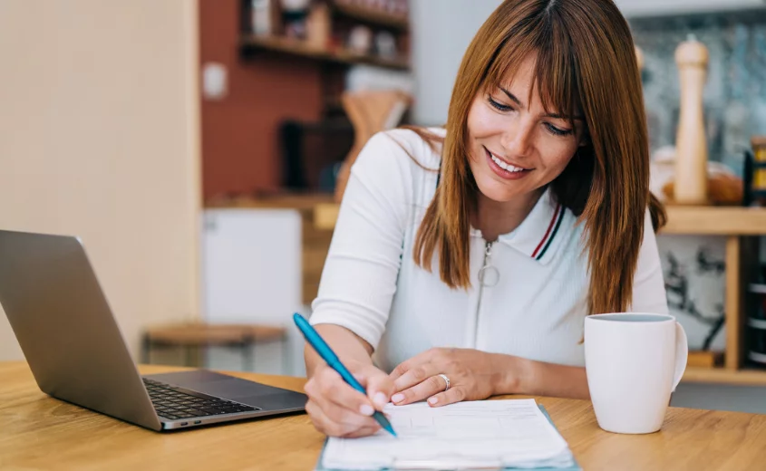 Person filling out paperwork
