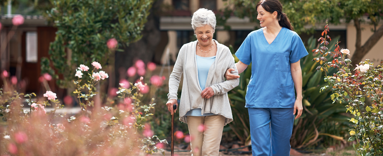 Nurse helping person at nursing home