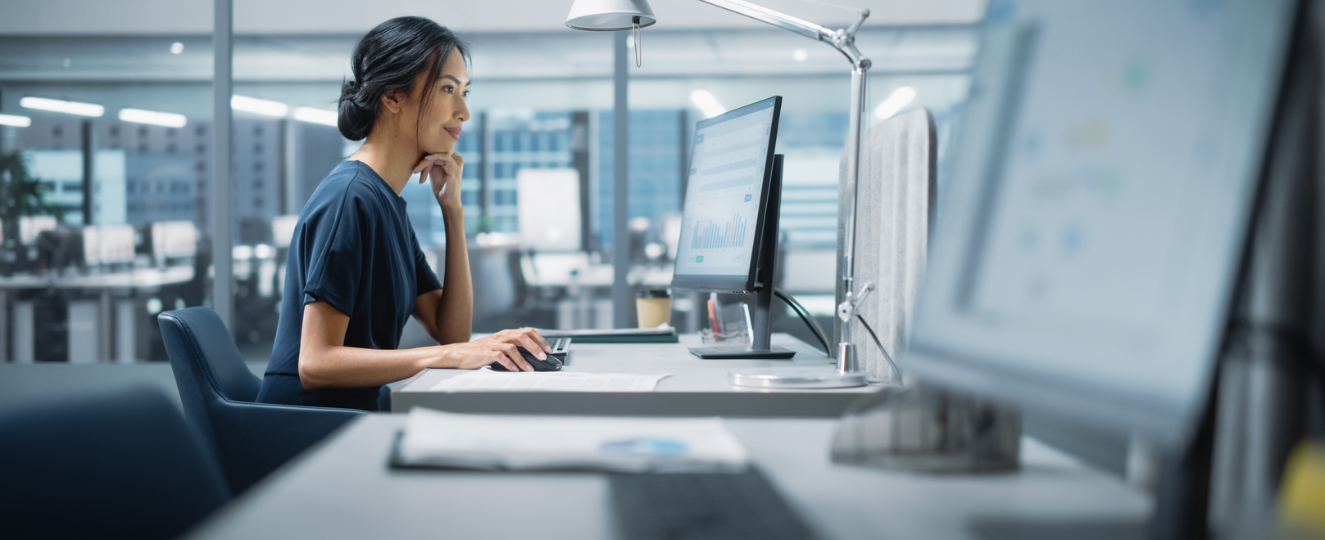 Person focused and working on computer