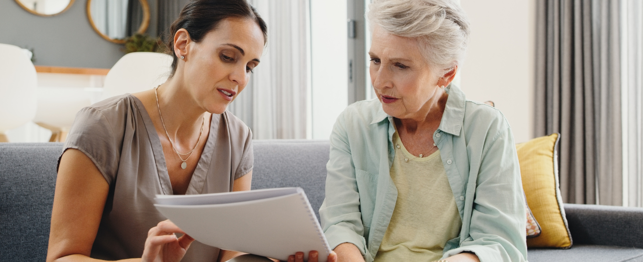 People discussing estate documents