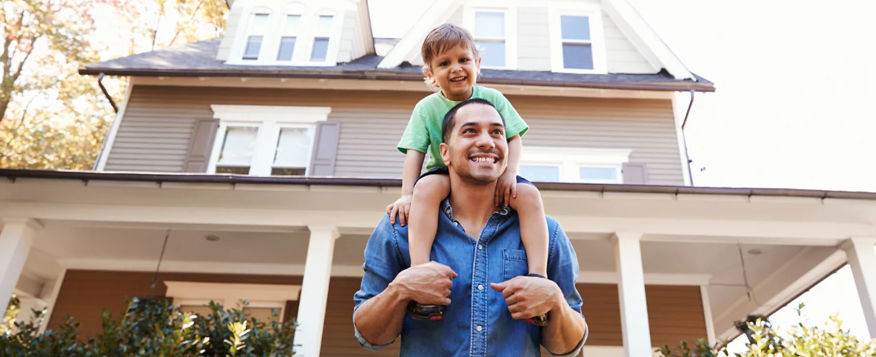People in front of a home